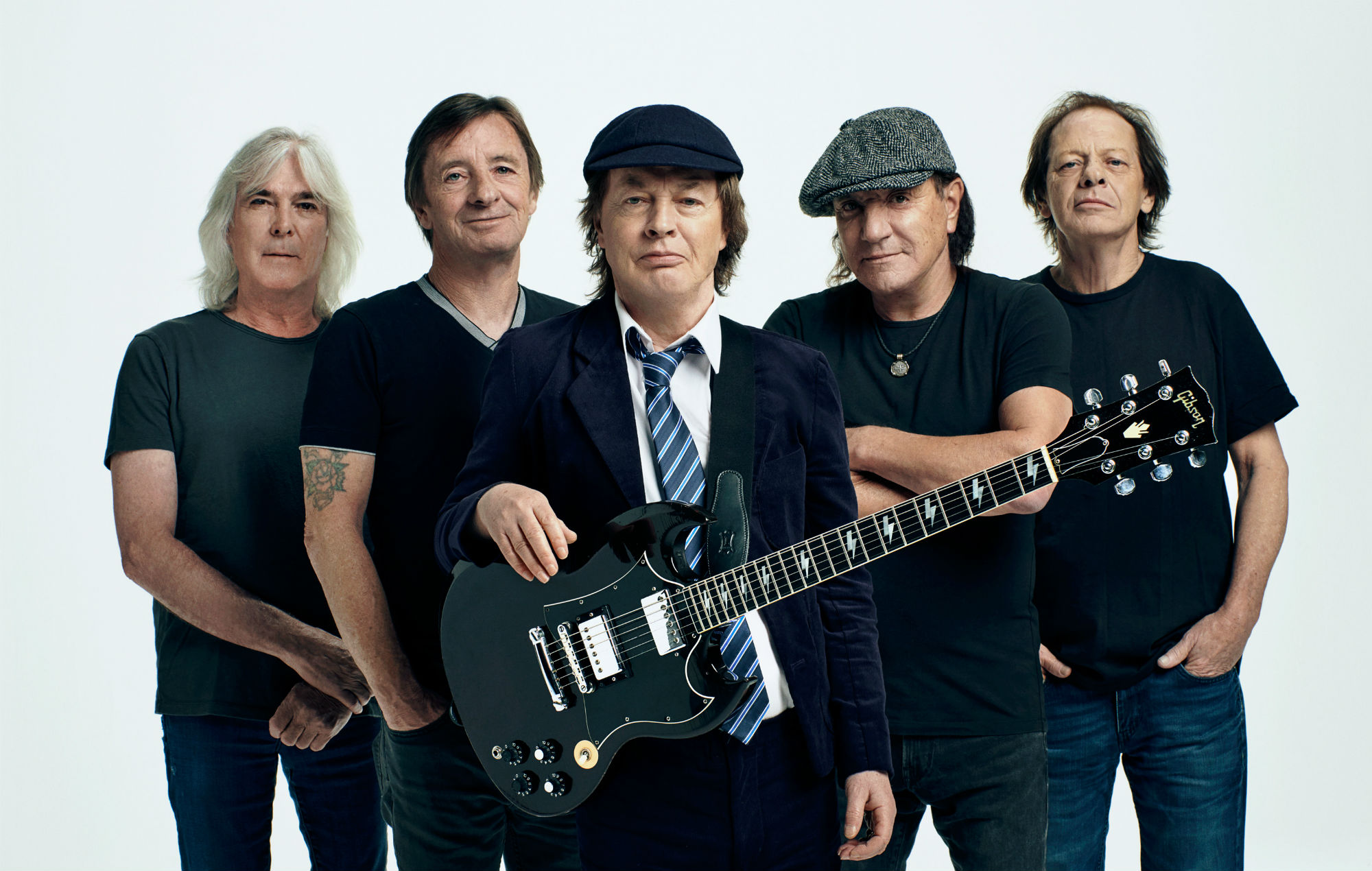 Angus Young Autographs a Baby at Toronto Pop-Up Following AC/DC Show Cancellation